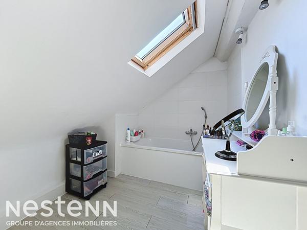 Charmante maison familiale de 85 m² avec sous-sol total et grand garage
