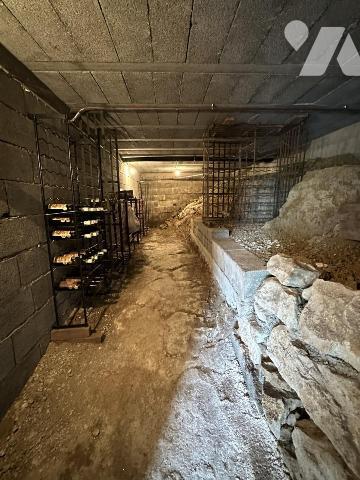 Maison plain pied 3 chambres, une cuisine, une cave, un garage