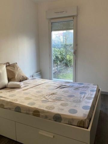 Appartement Montevrain 2 pièce(s) 41.30 m2 rez-de-jardin + parking + cave