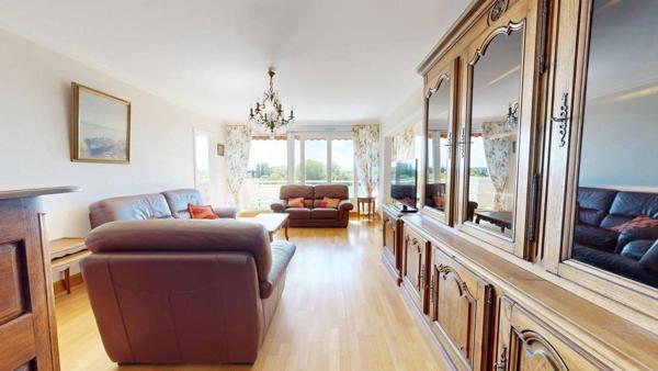 Bel appartement T3 de 88 m² avec terrasse, cave et stationnement