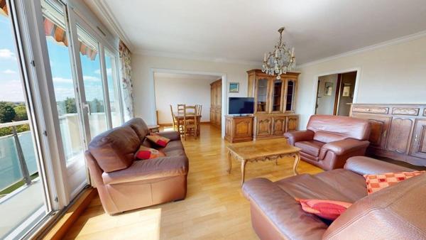 Bel appartement T3 de 88 m² avec terrasse, cave et stationnement