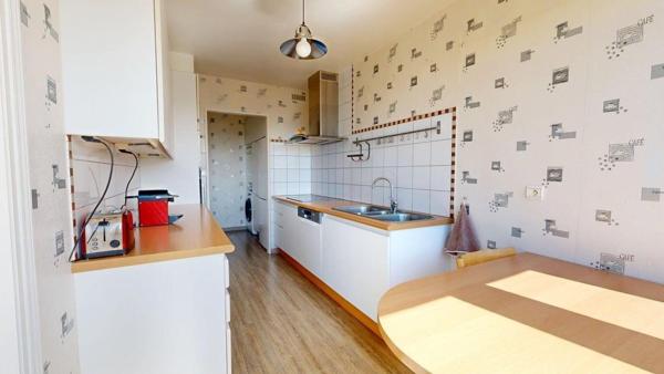 Bel appartement T3 de 88 m² avec terrasse, cave et stationnement