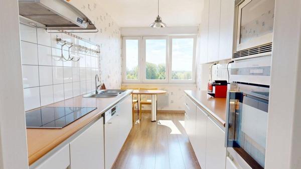 Bel appartement T3 de 88 m² avec terrasse, cave et stationnement