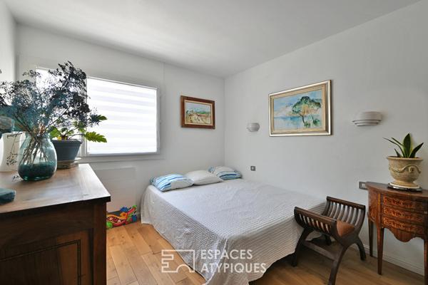 Appartement rénové avec terrasse, tennis et piscine dans un écrin de verdure