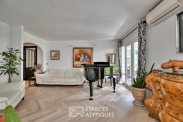 Appartement rénové avec terrasse, tennis et piscine dans un écrin de verdure