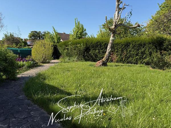 Maison individuelle avec 4 chambres, sous-sol et jardin