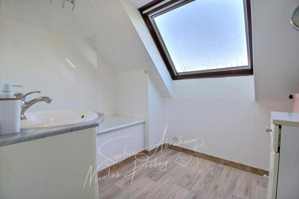 Maison individuelle avec 4 chambres, sous-sol et jardin