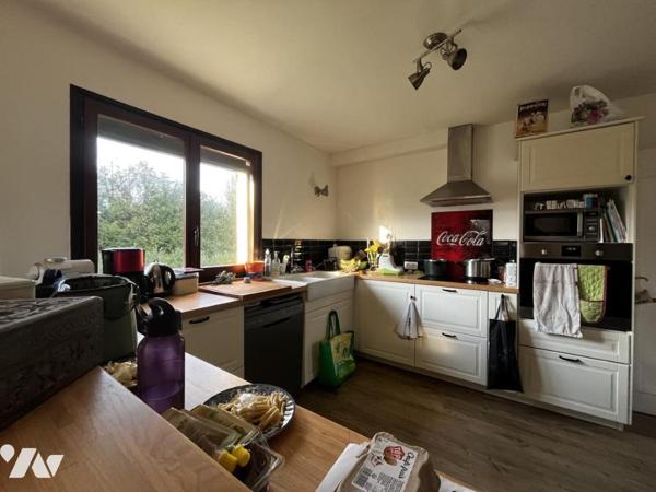 Maison à usage d'habitation édifiée sur sous-sol total