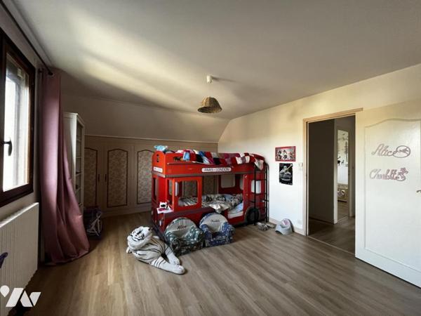 Maison à usage d'habitation édifiée sur sous-sol total