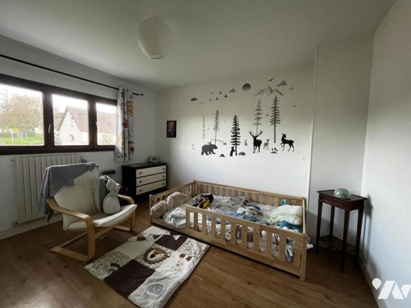 Maison à usage d'habitation édifiée sur sous-sol total