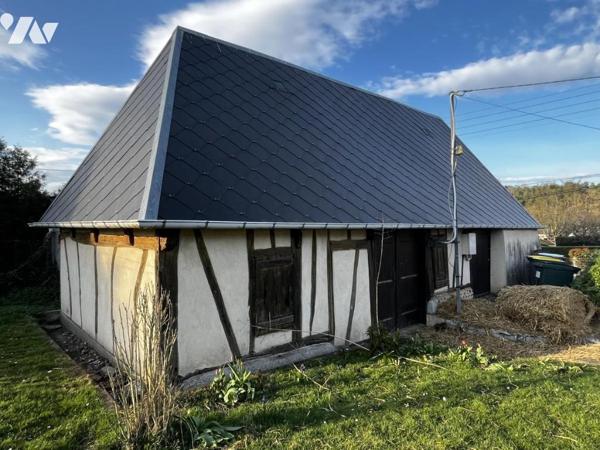 Maison à usage d'habitation édifiée sur sous-sol total