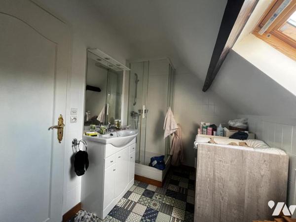 Maison à usage d'habitation édifiée sur sous-sol total