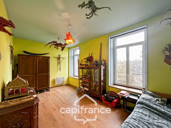 Authentique maison en pierre 10 pièces 220m² avec dépendances et parc arboré