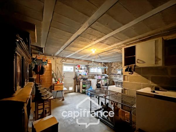 Authentique maison en pierre 10 pièces 220m² avec dépendances et parc arboré