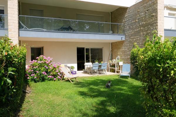 Appartement type 2 + parking + terrasse + jardin