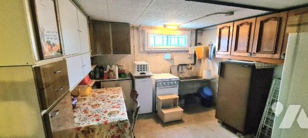 Maison à usage d'habitation située à SABLÉ-SUR-SARTHE.