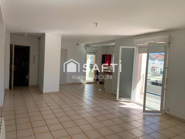 Investissement locatif T4 de 100 m² avec garage double au cœur de Vaulx-Milieu