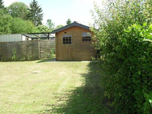 maison de plain pied avec 2 chambres et un grand garage