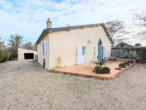 maison de plain pied avec 2 chambres et un grand garage