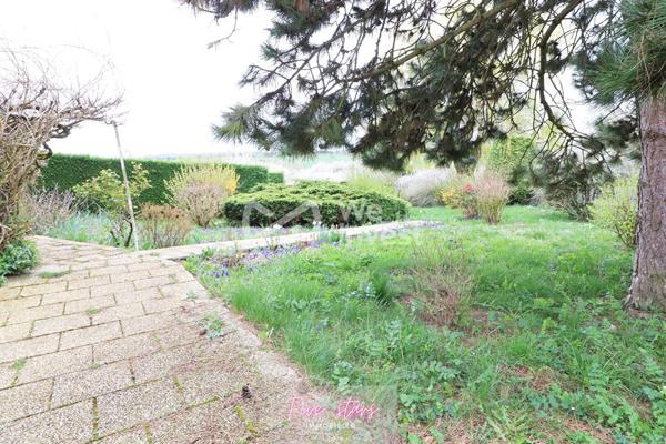 Jolie maison avec jardin et garage
