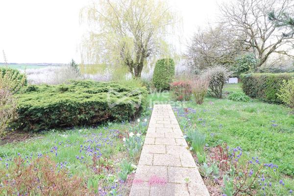 Jolie maison avec jardin et garage