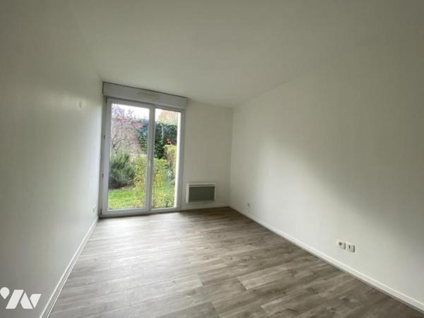 Appartement 5 pièces avec jardin, garage et cave.