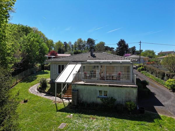 Maison sur sous-sol semi enterré de 3 chambres