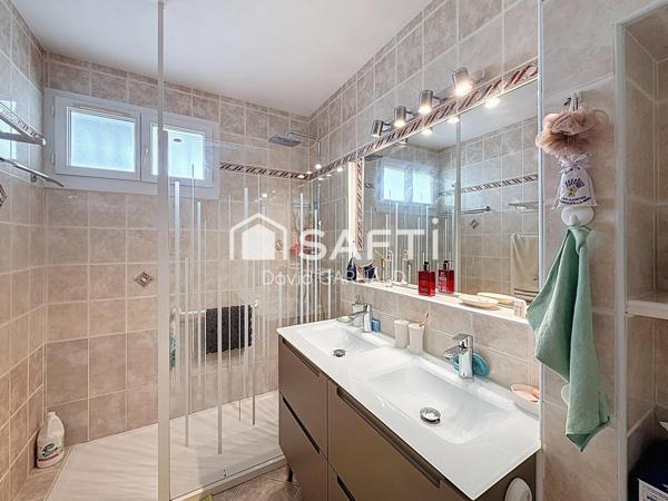 Maison sur sous-sol semi enterré de 3 chambres