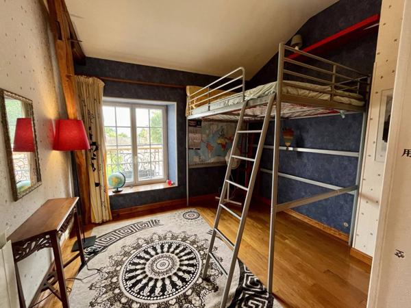 Maison 10 pièces 248 m² habitable.