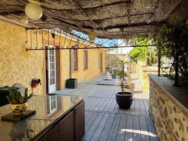 Maison 10 pièces 248 m² habitable.