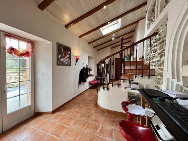 Maison 10 pièces 248 m² habitable.