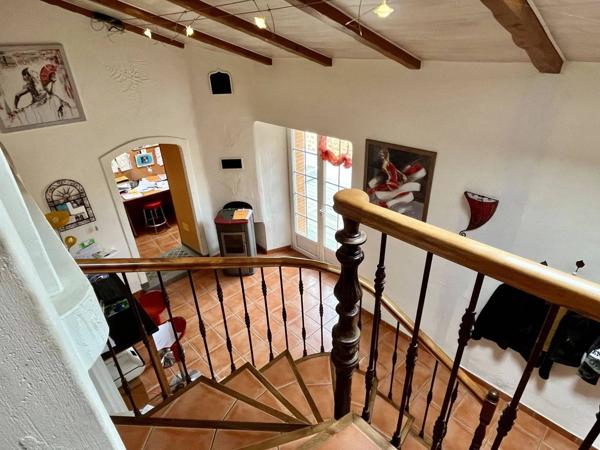 Maison 10 pièces 248 m² habitable.