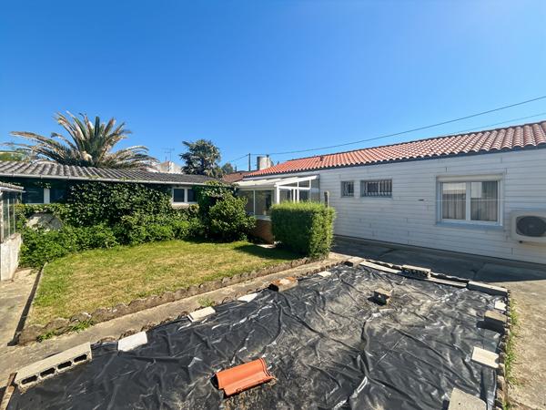 Maison rénovée avec 3 chambres, véranda et garage à proximité immédiate de la zone Hyper U de Challans