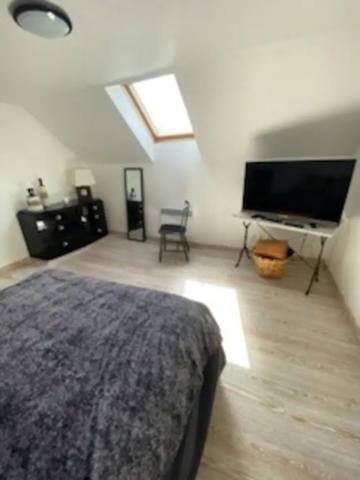 Maison familiale 4 chambres avec jardin, Bouessay