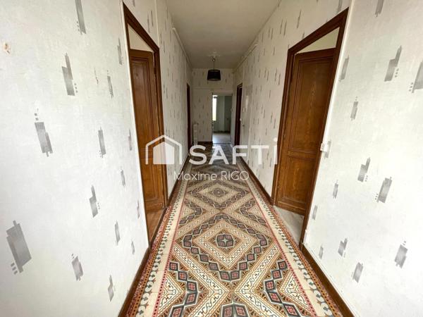 Maison de ville 7 pièces avec garage et jardin