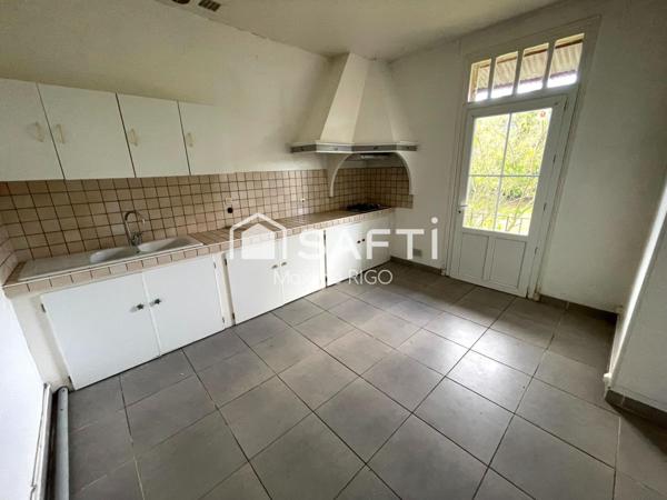 Maison de ville 7 pièces avec garage et jardin