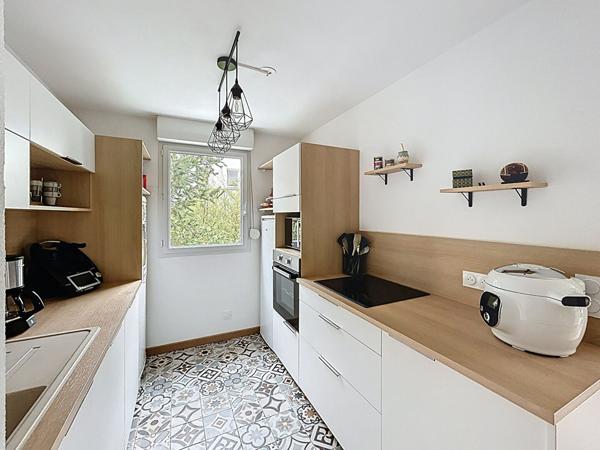 Appartement T3 avec terrasse couverte et place de parking