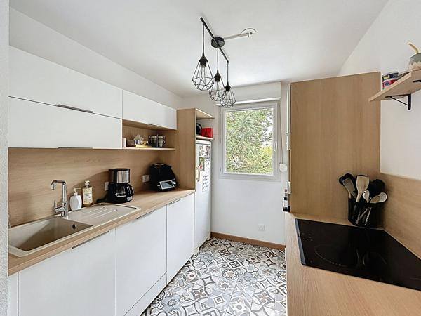 Appartement T3 avec terrasse couverte et place de parking