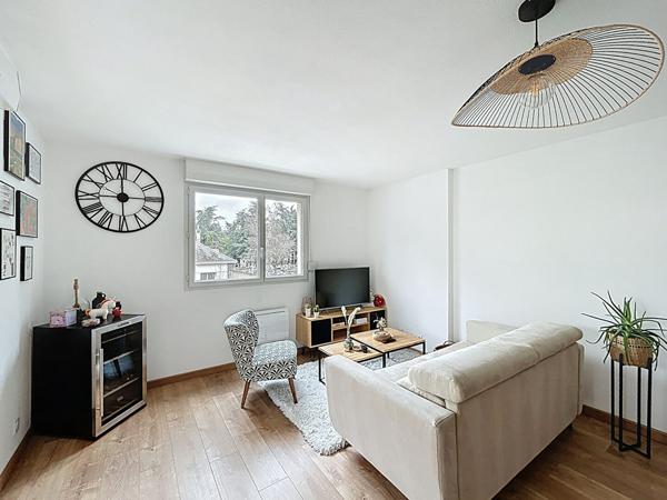 Appartement T3 avec terrasse couverte et place de parking