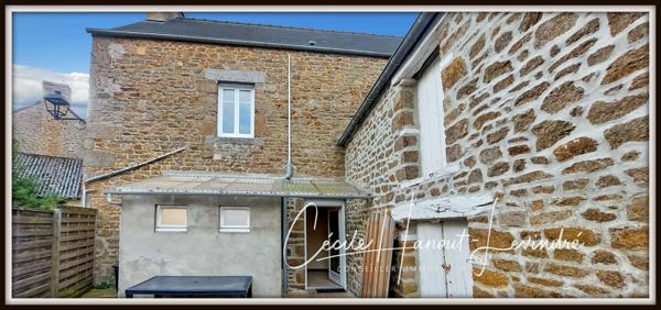 Saint-Marcan (35120) SAINT-MARCAN . Bourg. Maison en pierre 110 m² avec dépendances et courette.