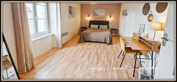 Saint-Marcan (35120) SAINT-MARCAN . Bourg. Maison en pierre 110 m² avec dépendances et courette.