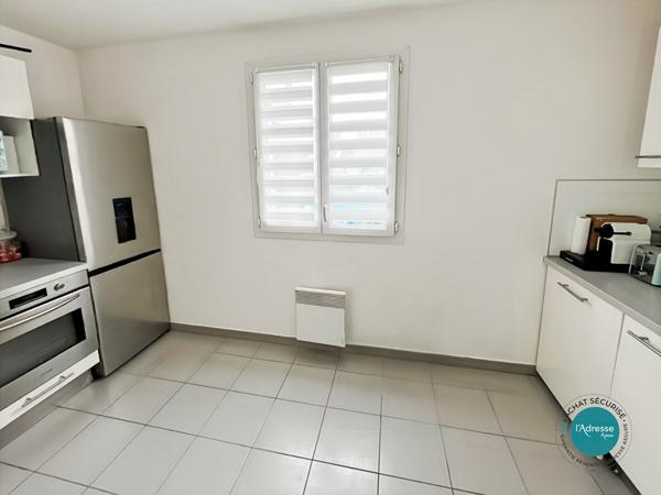 Maison mitoyenne avec 2 chambres jardin et garage