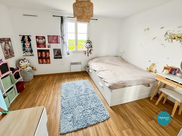 Maison mitoyenne avec 2 chambres jardin et garage