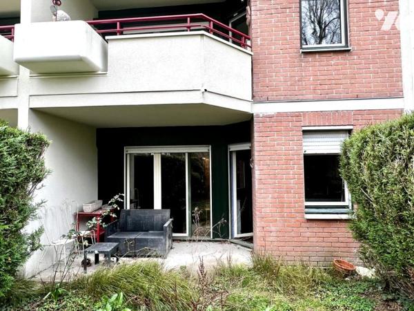 A vendre LILLE Canteleu, appartement de type III en rez-de-jardin, parking, cave.