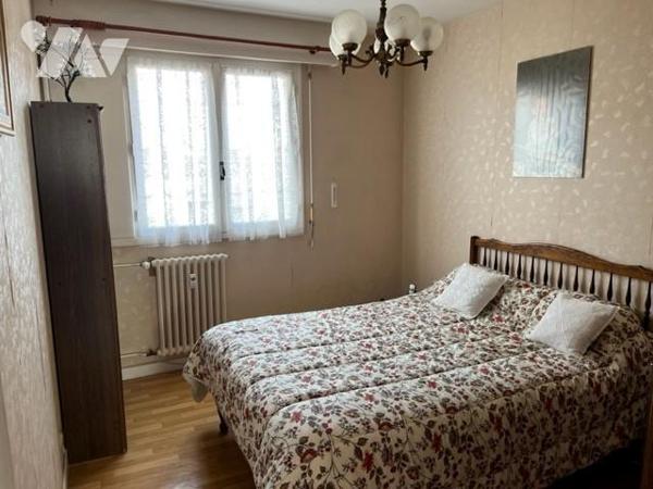 T4 avec cave et garage 