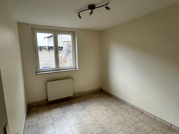 Immeuble Moulins 3 appartements + local 100 m2 + 2 garages + terrain