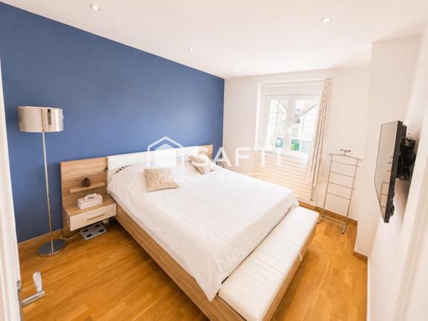 Maison de caractère offrant espace, confort et fonctionnalité recherchés par les familles d'aujourd'hui.