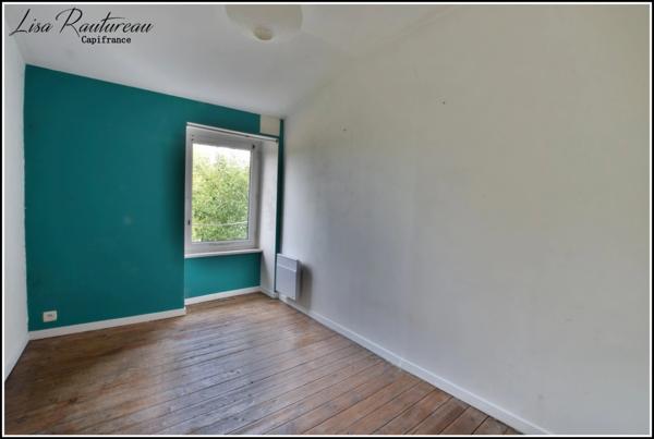 Maison à vendre + Appartement en location - Centre historique de MONTAIGU (85)