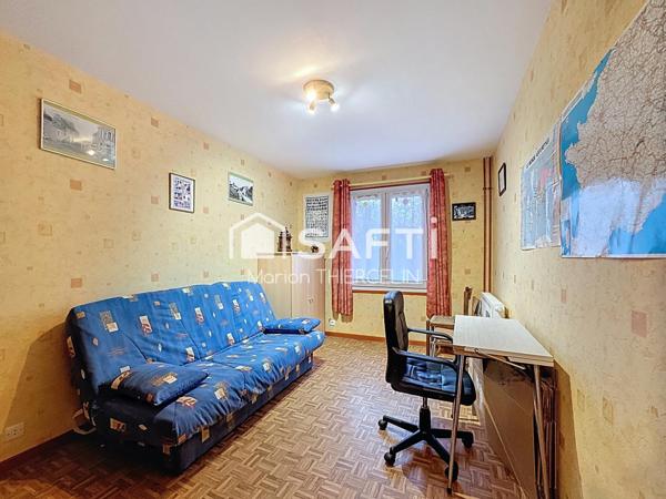 Maison de plain-pied avec 3 chambres et garage attenant