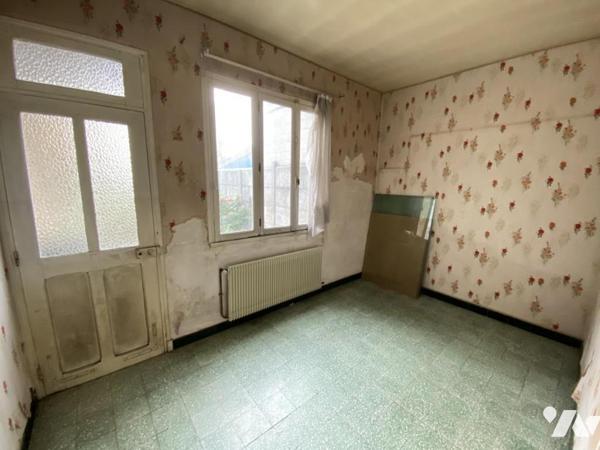 A VILLERS BRETONNEUX Maison Mitoyenne